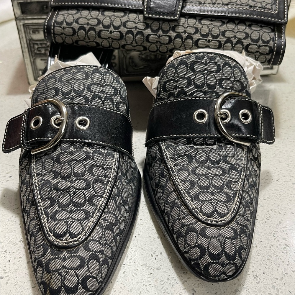 Coach Black Signature Canvas Buckle Slip-On Loafers matching wallet.